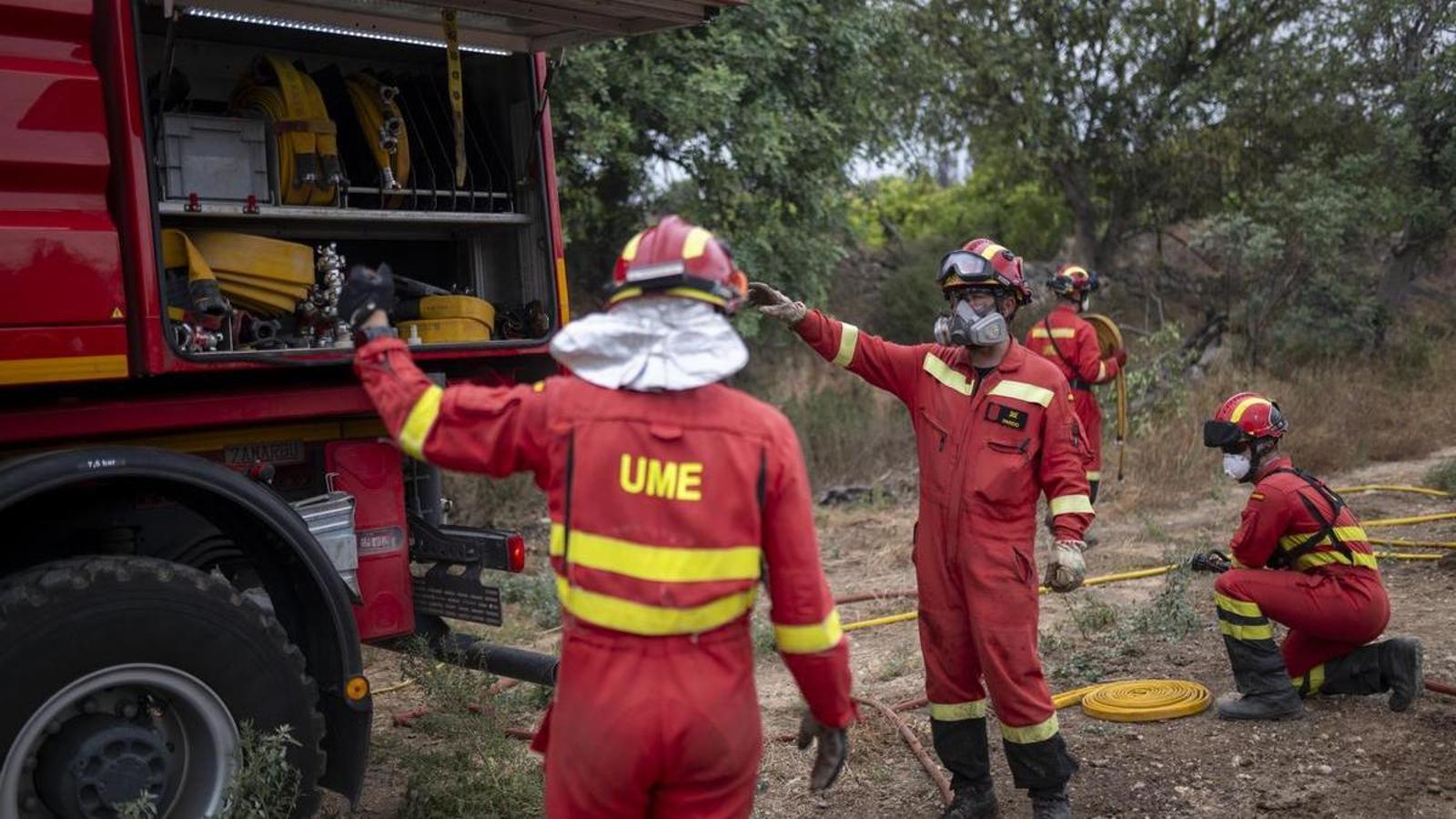 UME firefighters work on the Paüls fire in July.