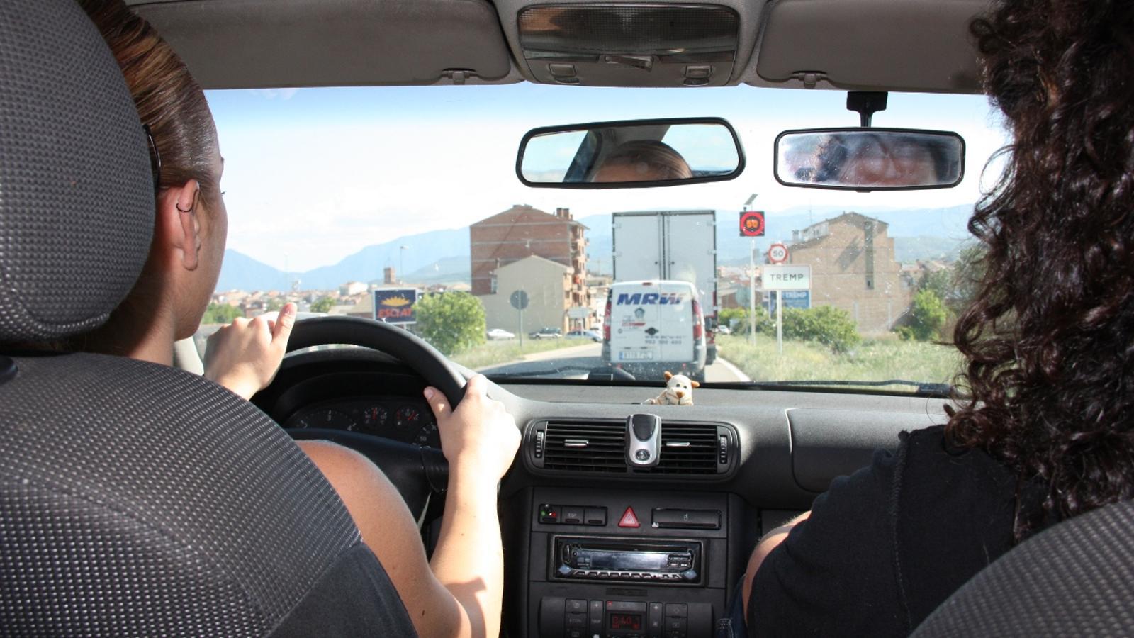 A girl doing driving practice in Tremp.