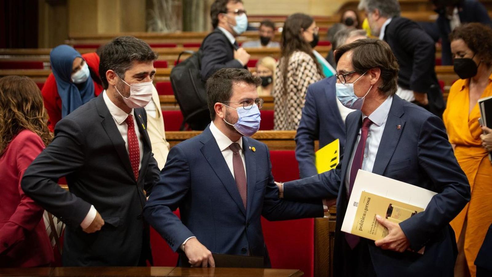 Pere Aragonès, Jordi Puigneró y Salvador Illa, en una imagen de archivo en el Parlamento