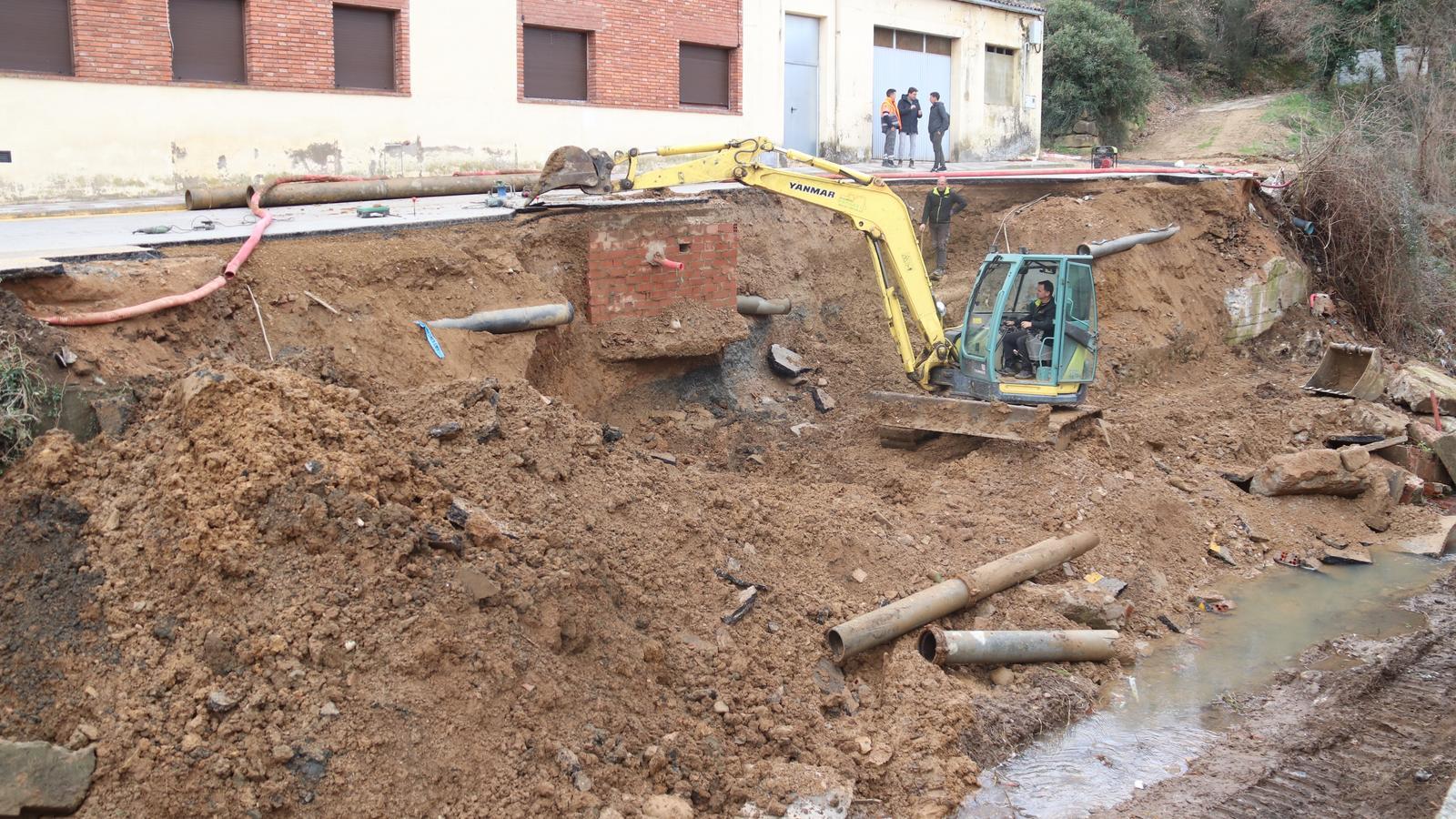 A machine is working on repairing the water pipe that has left the entire town without water.