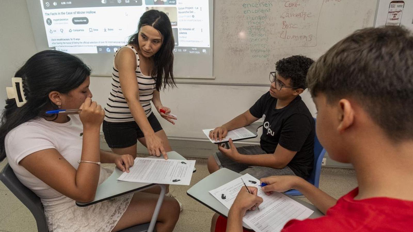 Isis and Adam in an activity of the Accelerated Welcome Classroom that they did this summer.