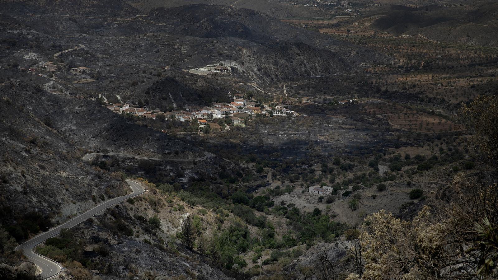 El Marchal, one of the developments affected by the fire, surrounded by scorched landscape.