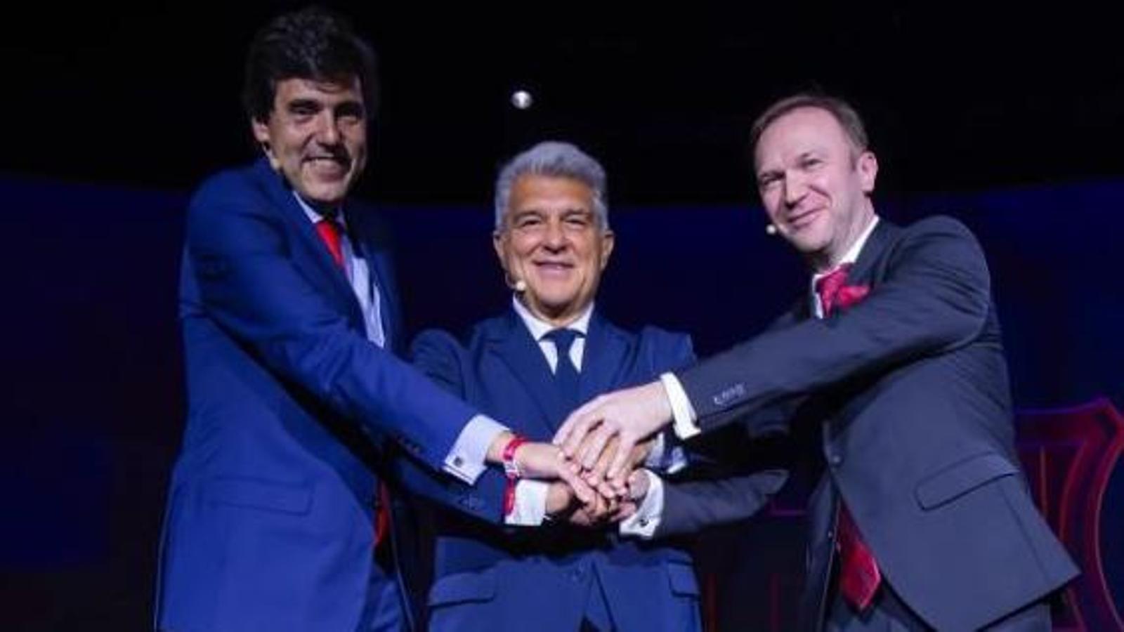 Joaquín Colino, Joan Laporta and Ruslan Birladeanu during the presentation of Barça Mobile.