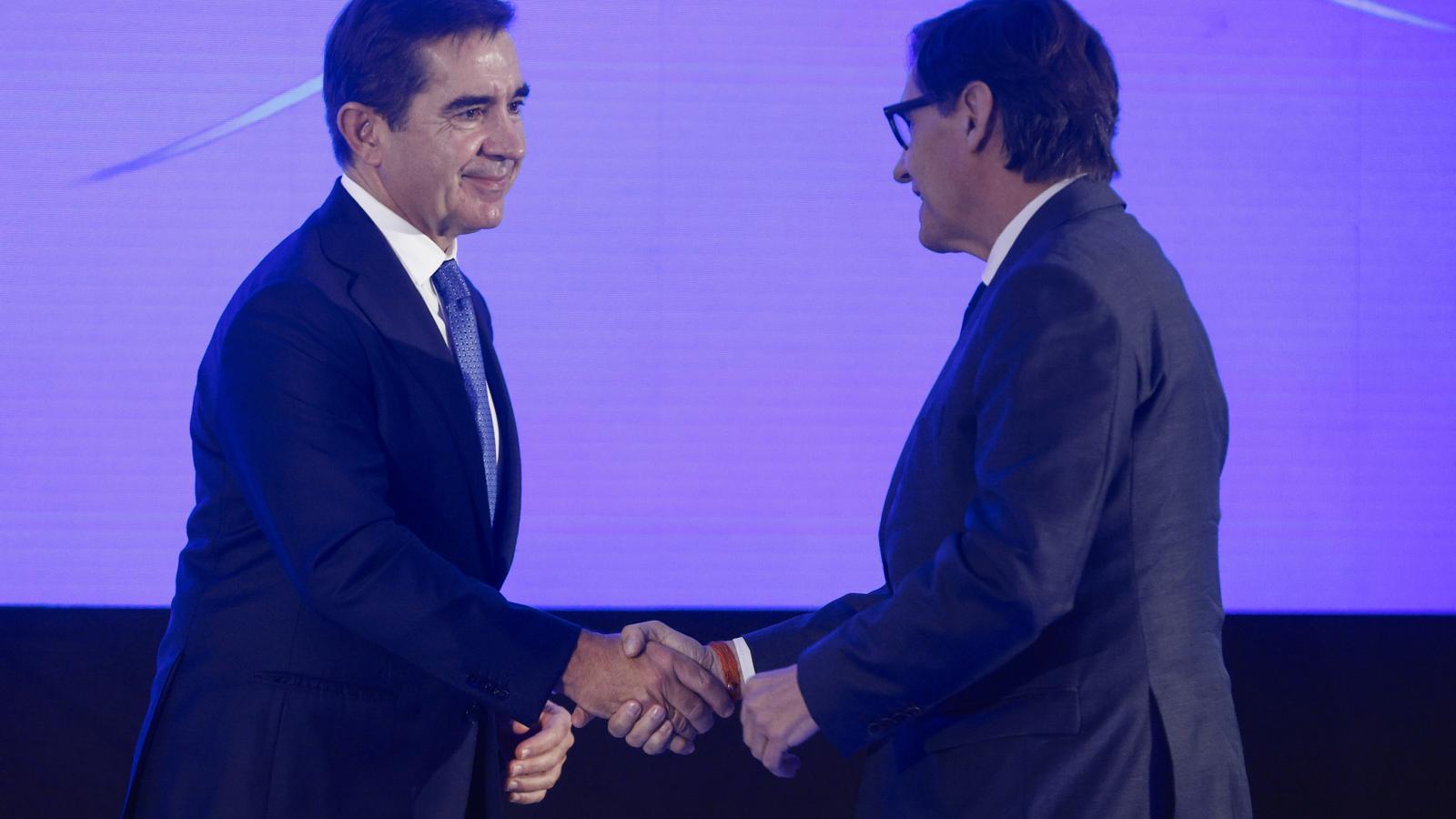 The president of BBVA, Carlos Torres, and the president of the Generalitat, Salvador Illa, during the conference.