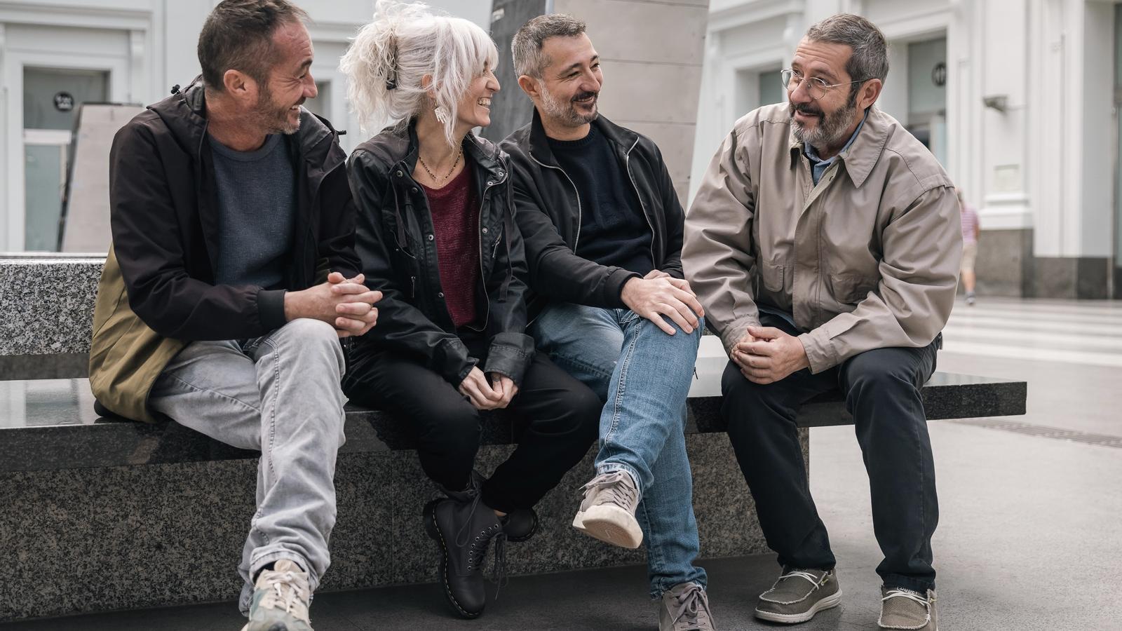 Los tres hermanos con Carles Porta