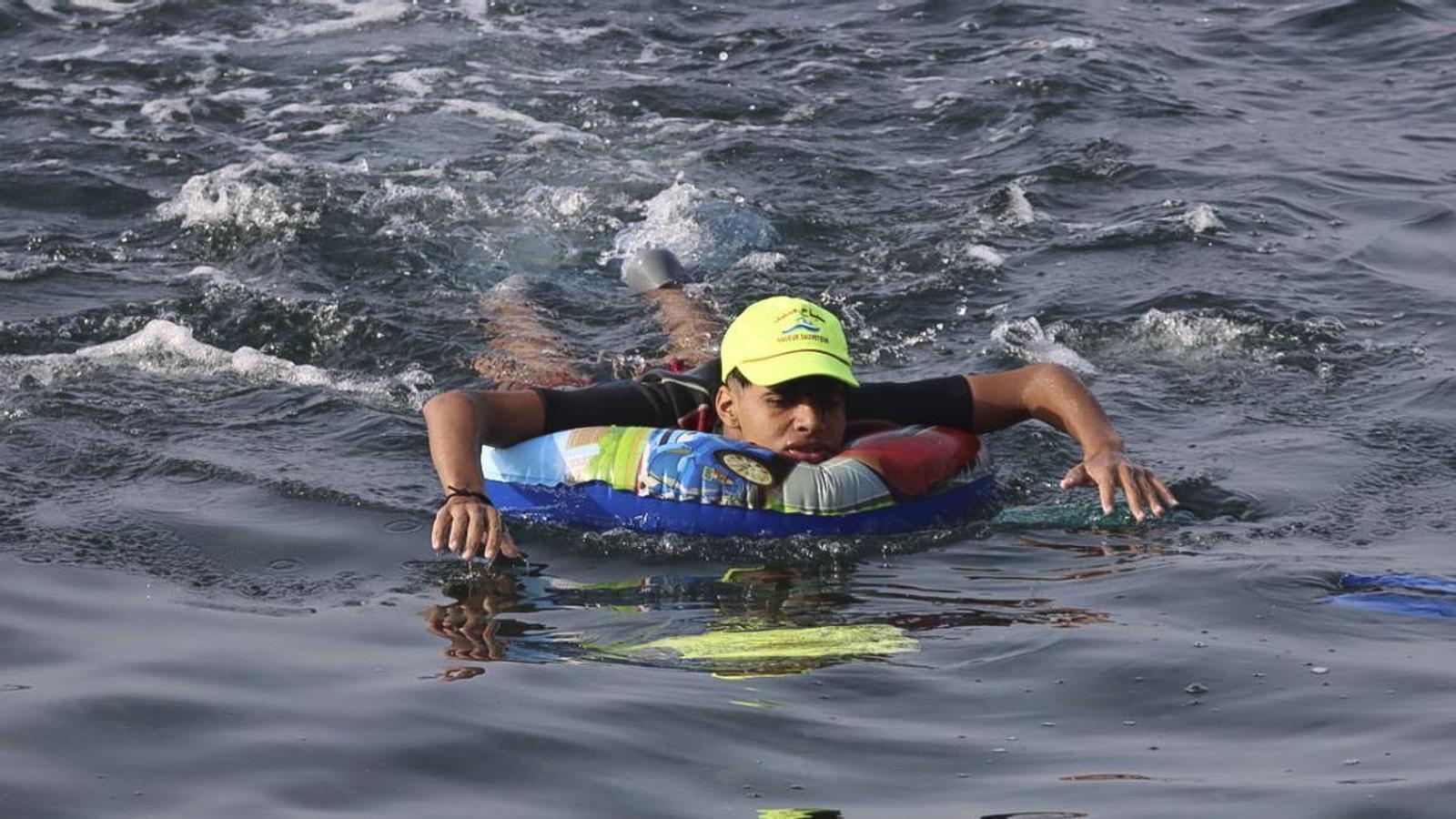 A young person arriving by sea to Ceuta, on July 31, 2026.
