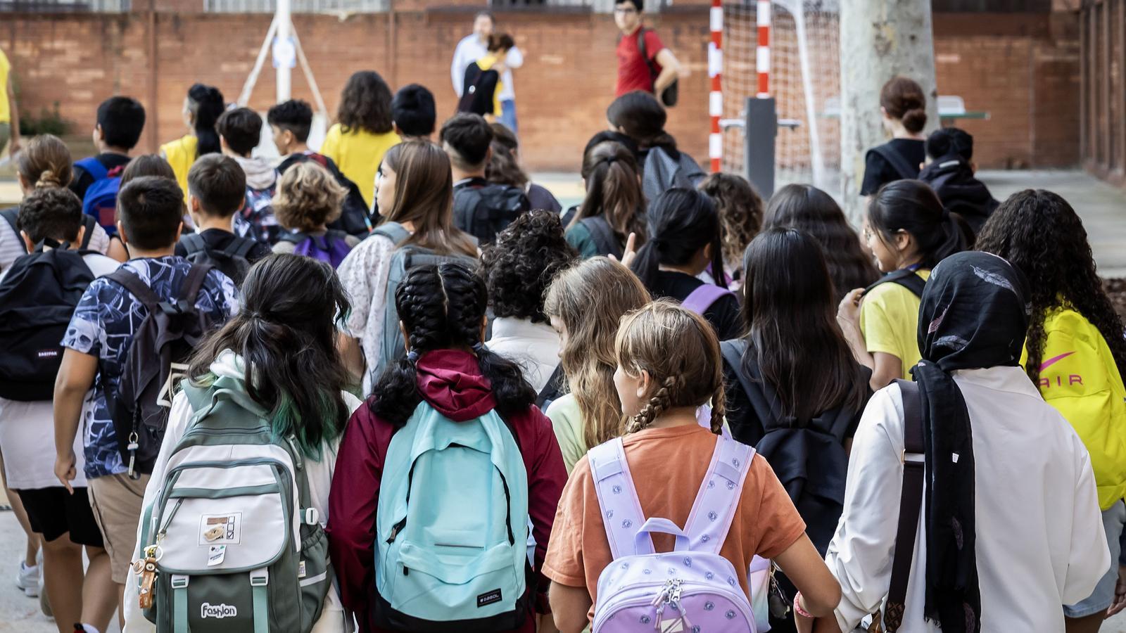 Primer día del curso escolar en un centro del barrio barcelonés de Sants.