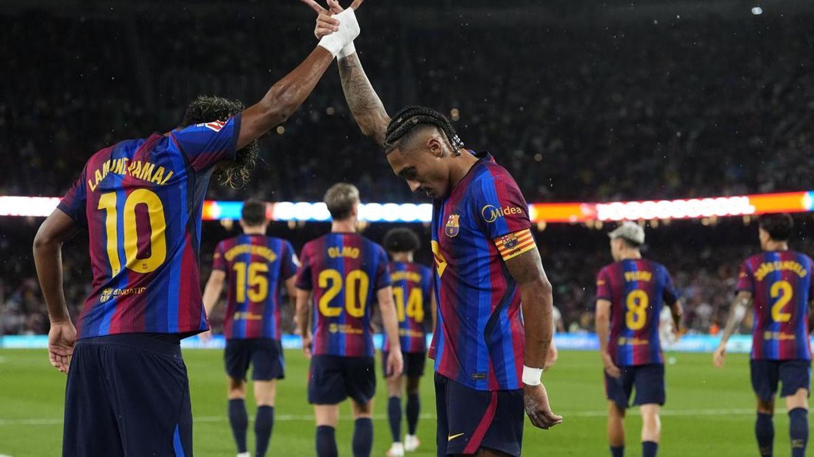 Lamine Yamal and Raphinha, celebrating the Brazilian's goal against Racing