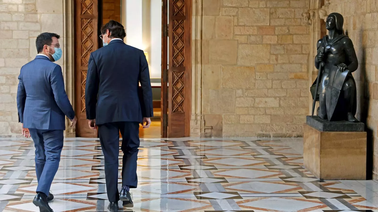 El presidente de la Generalitat, Pere Aragonès, y el líder del PSC, Salvador Illa, este miércoles.