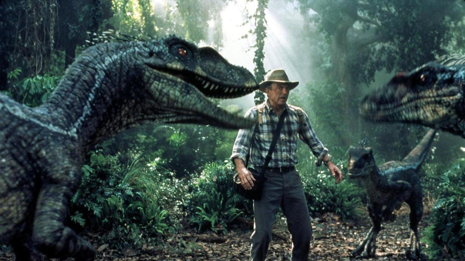 Dr. Alan Grant (Sam Neill) surrounded by dinosaurs, in Jurassic Park