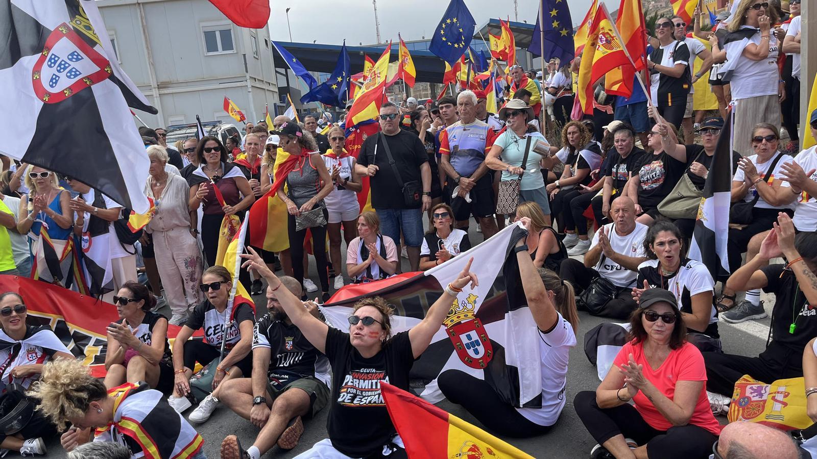 A group of people gathered at the Juan XXIII esplanade to start a protest march to the Tarajal border, this Sunday.