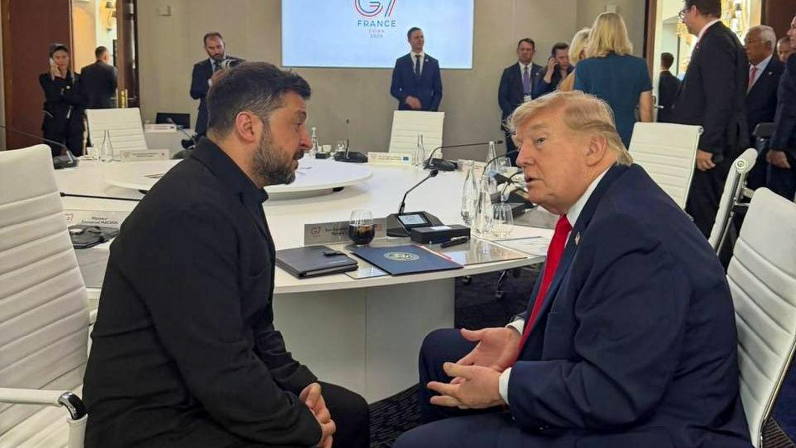 Zelenski y Trump reunidos después de un encuentro de grupo del G7