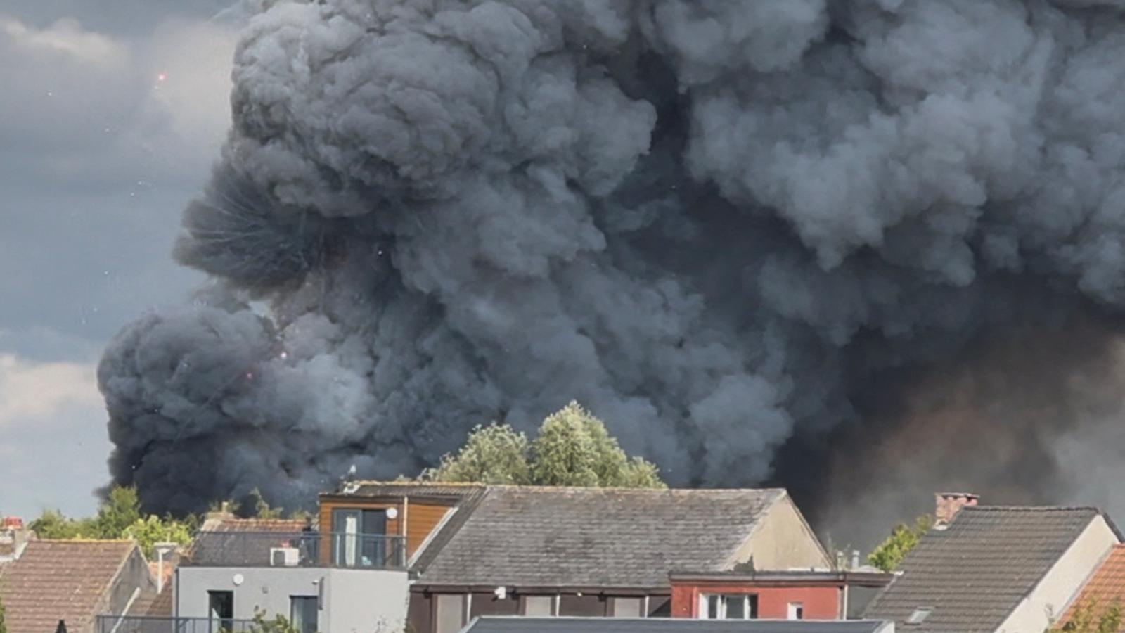 Smoke rises as a fire engulfs the main stage of Tomorrowland, an electronic music event, in Boom, Belgium, on July 16, 2025.