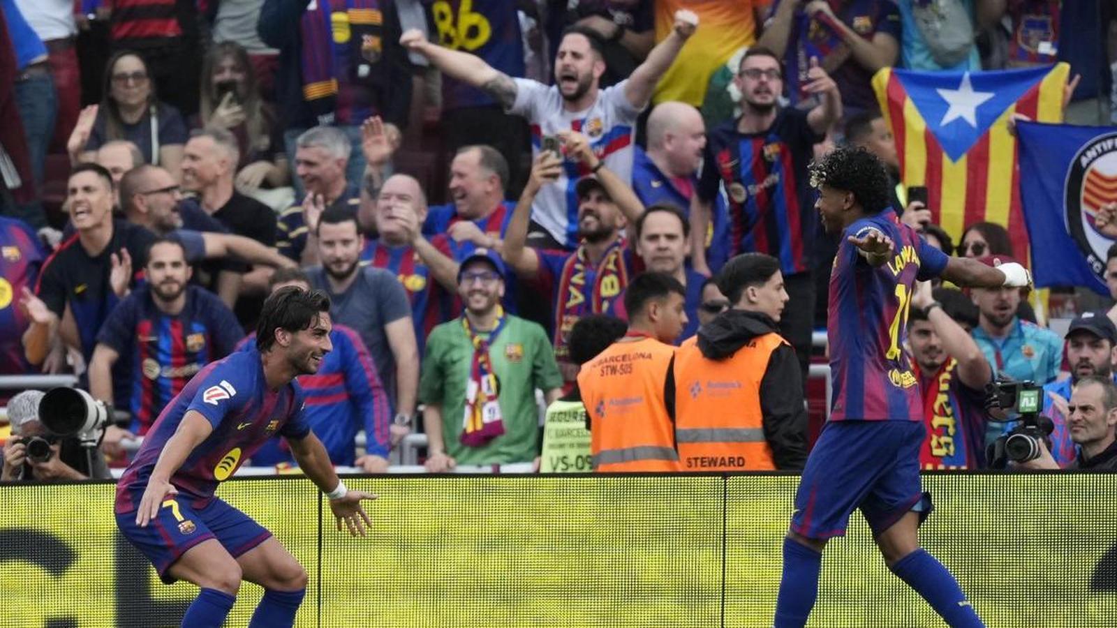 Ferran Torres and Lamine Yamal, celebrating the first goal in the derby
