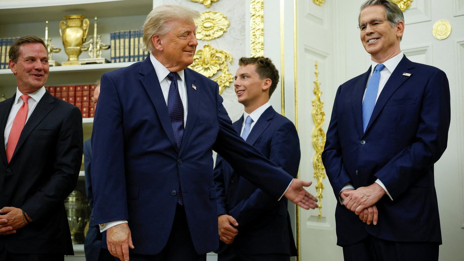 Trump this morning in the Oval Office