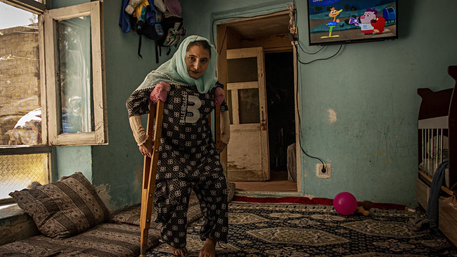 Fauzia, in the house where she lives in Kabul with her sister and her family.