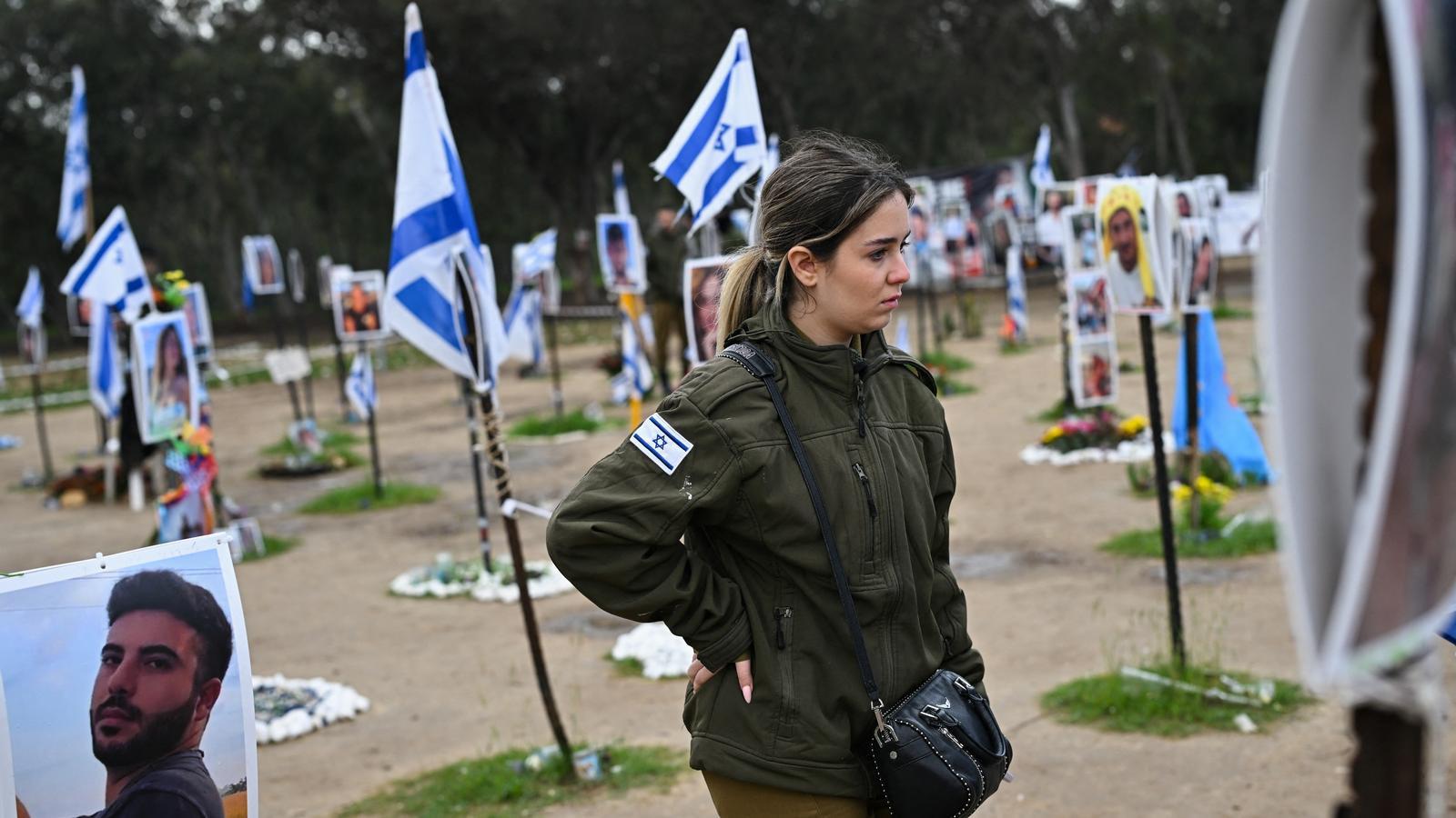 A woman visits the Nova Festival site, where Hamas attacked on October 7th