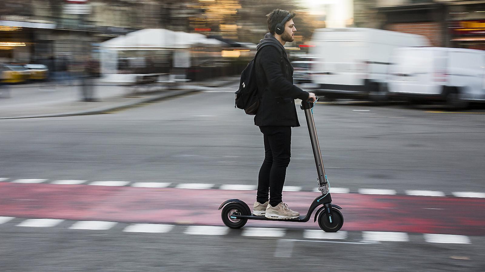 An electric scooter along Rambla Catalunya.