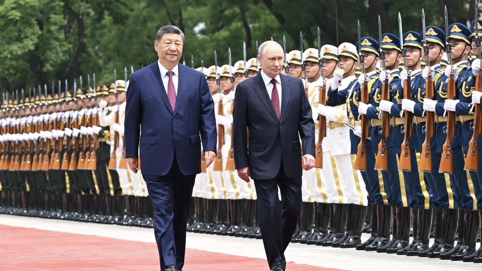 Xi Jinping y Putin durante la ceremonia de bienvenida en China