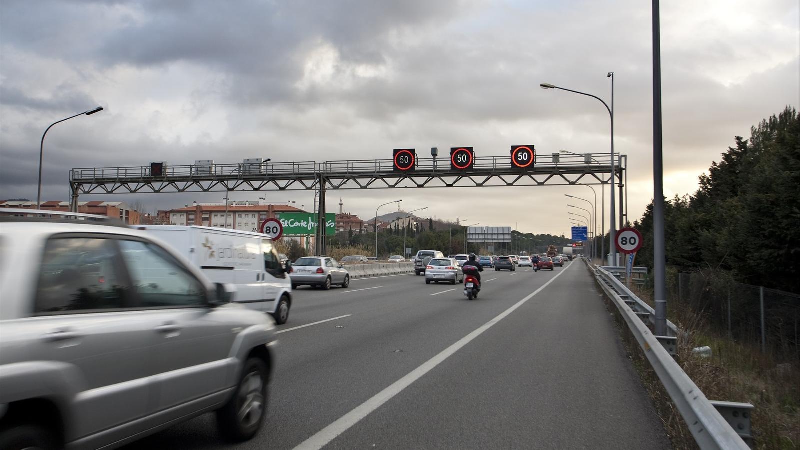 Vehicles circulating, in a stock image.