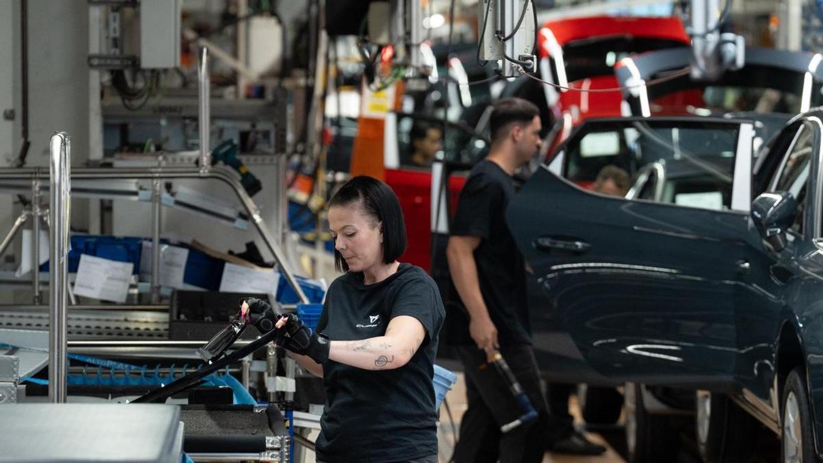 Workers in car production at the Seat factory in Martorell.