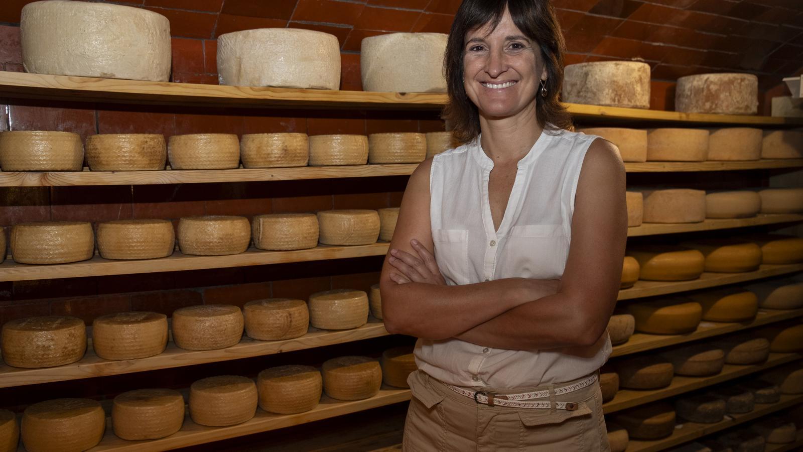 Gemma Urgell, in the cellars where they mature cheeses, in Vilafranca del Penedès