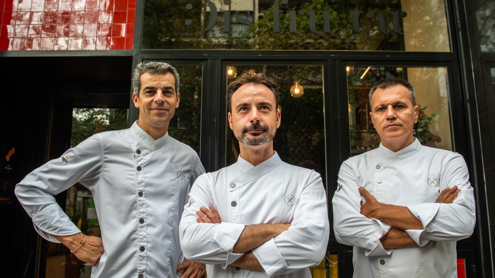Mateu Casañas, Eduard Xatruch and Oriol Castro, in front of the Disfrutar restaurant in Barcelona