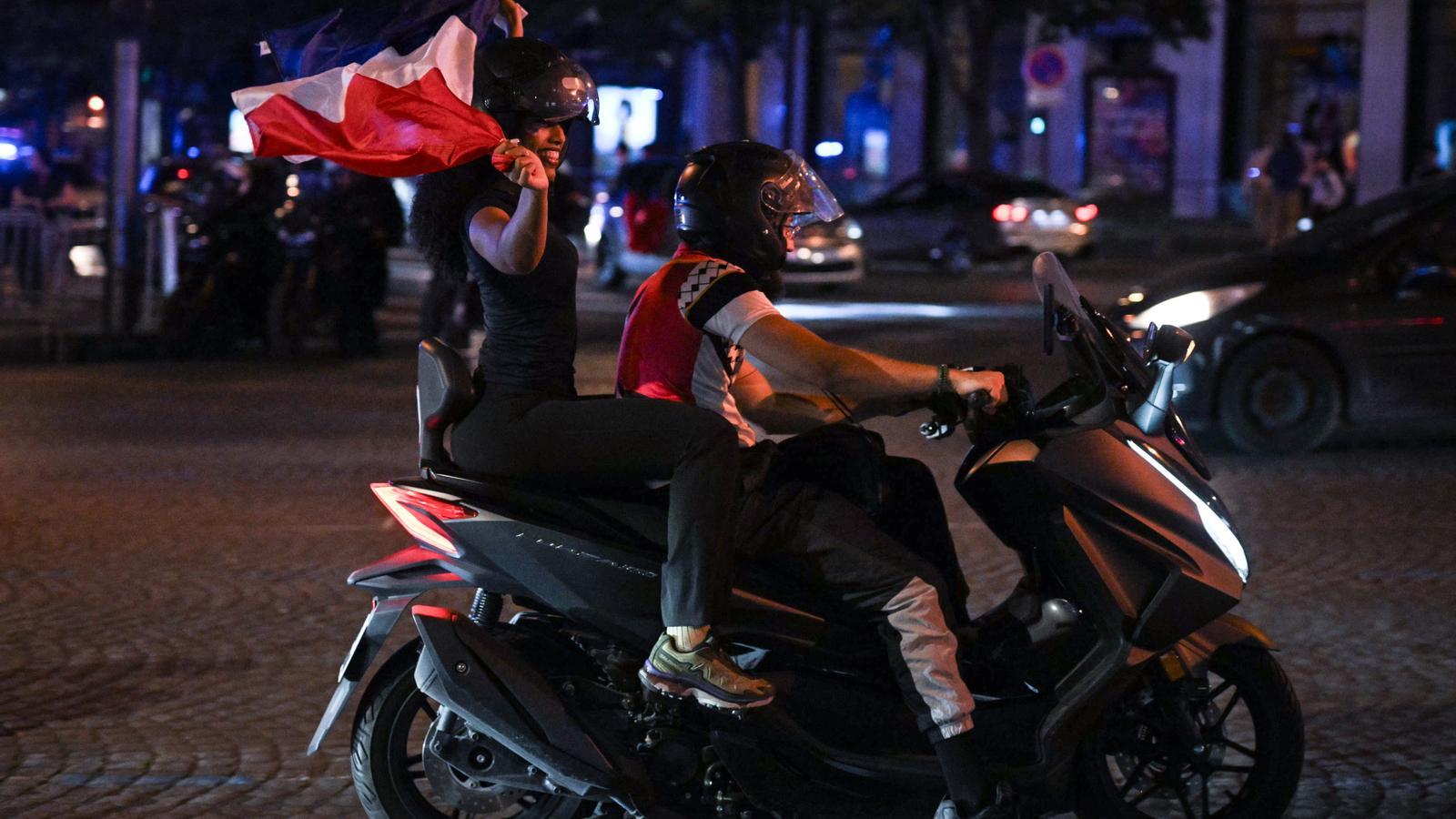 Celebrations in Paris for France's victory over Morocco in the World Cup