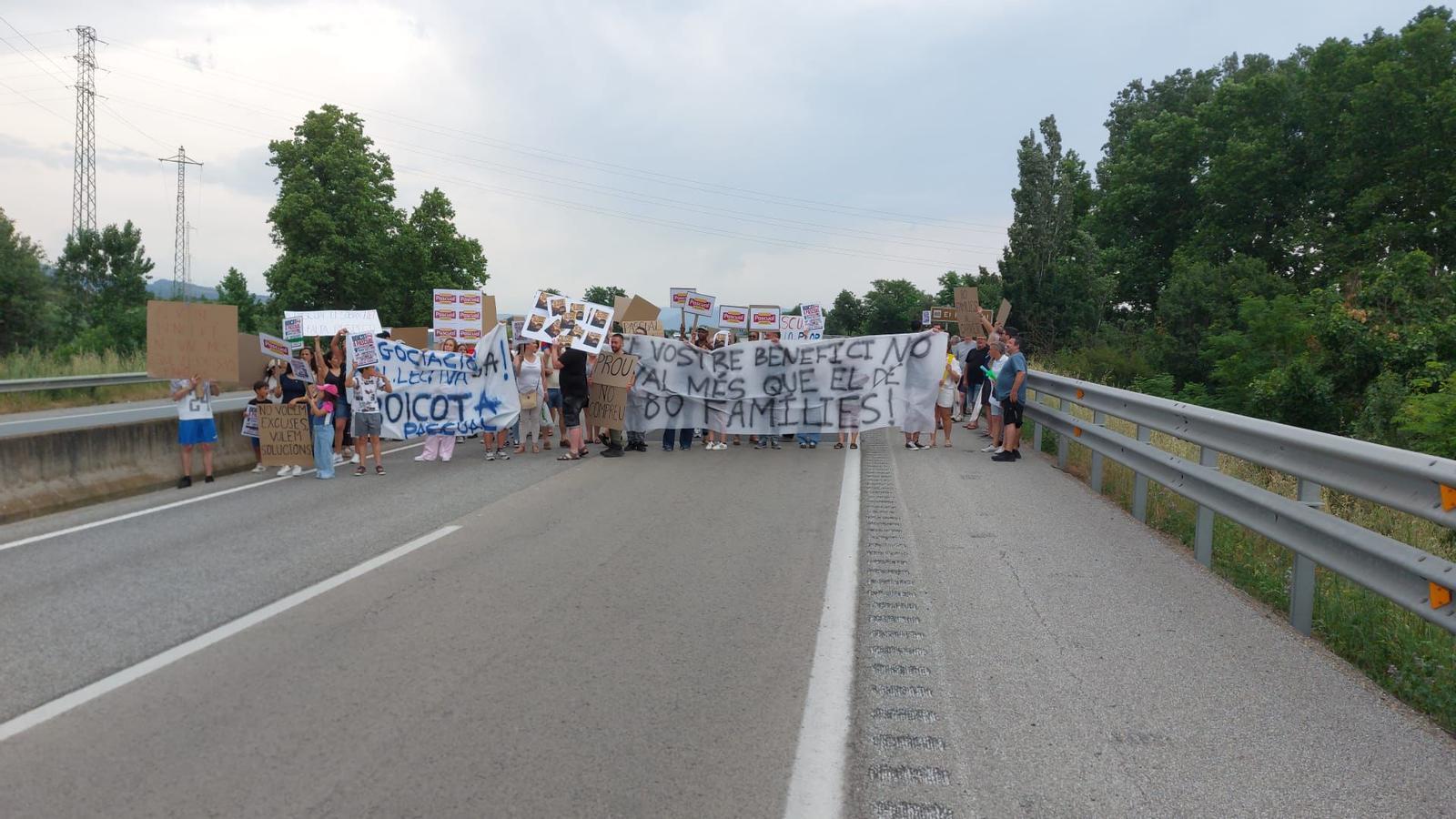 The workers of Leche Pascual in Gurb block the C-17