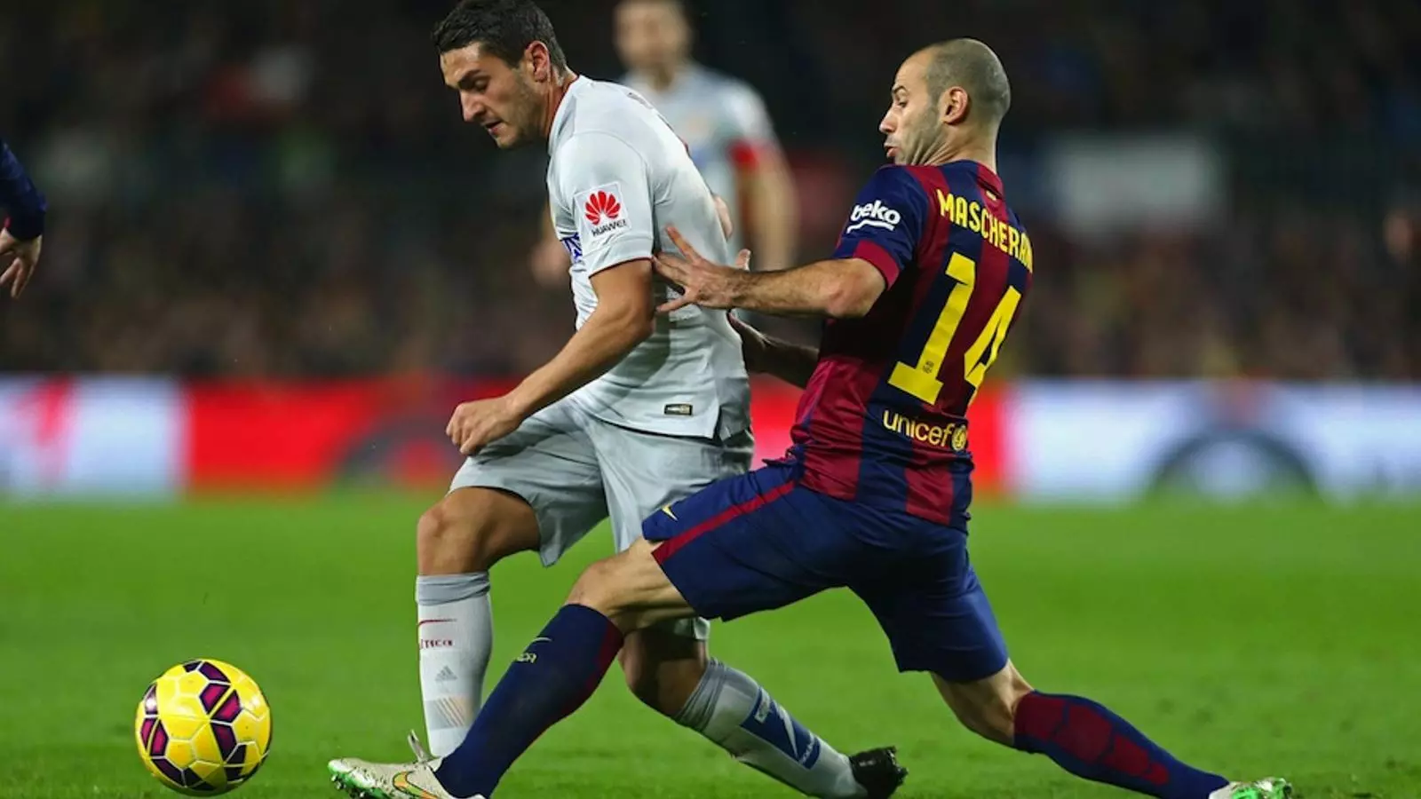 Koke i Javier Mascherano / EFE