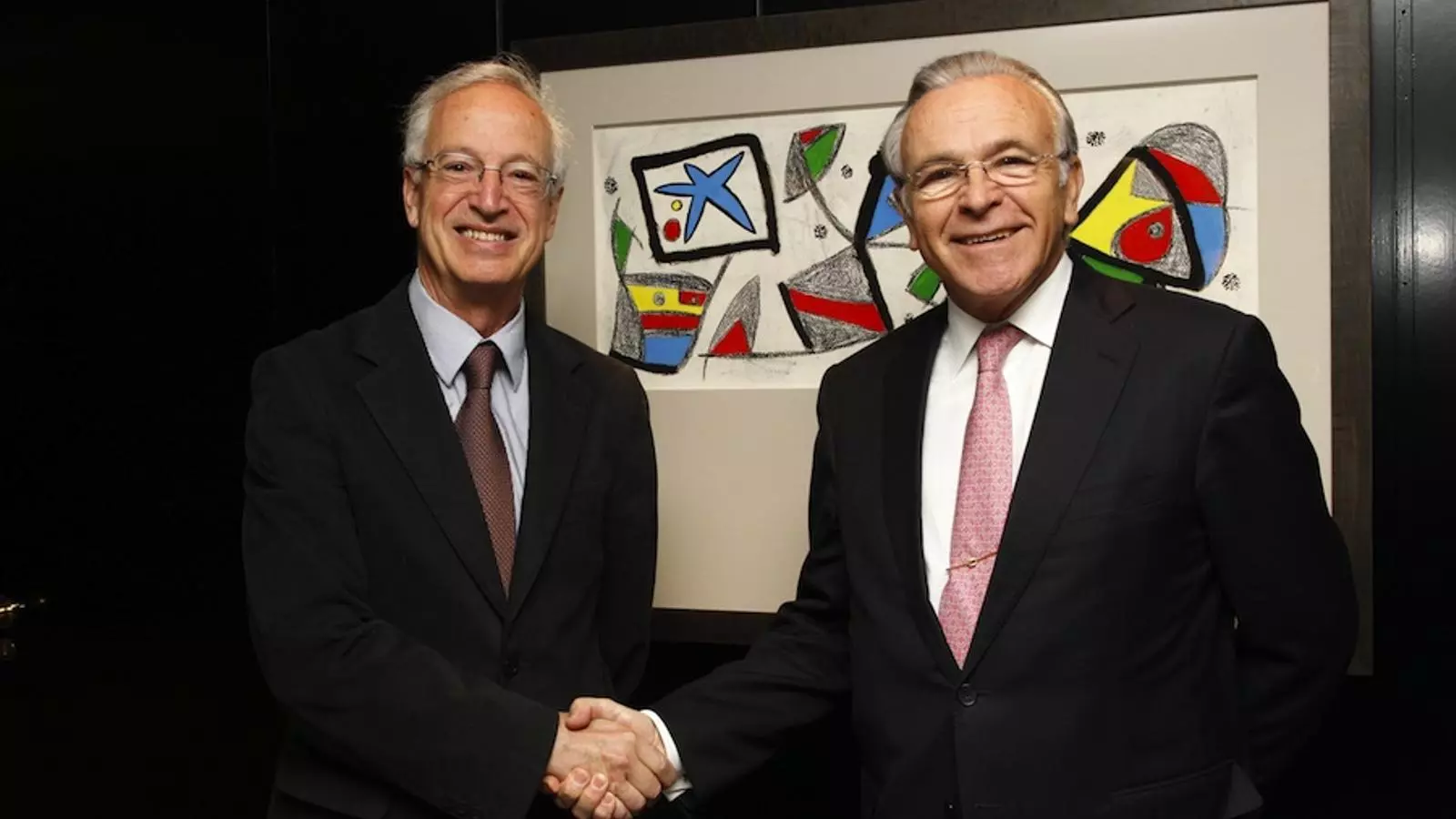 Isidro Fainé I Jaume Freixa, durant la firma de l'acord