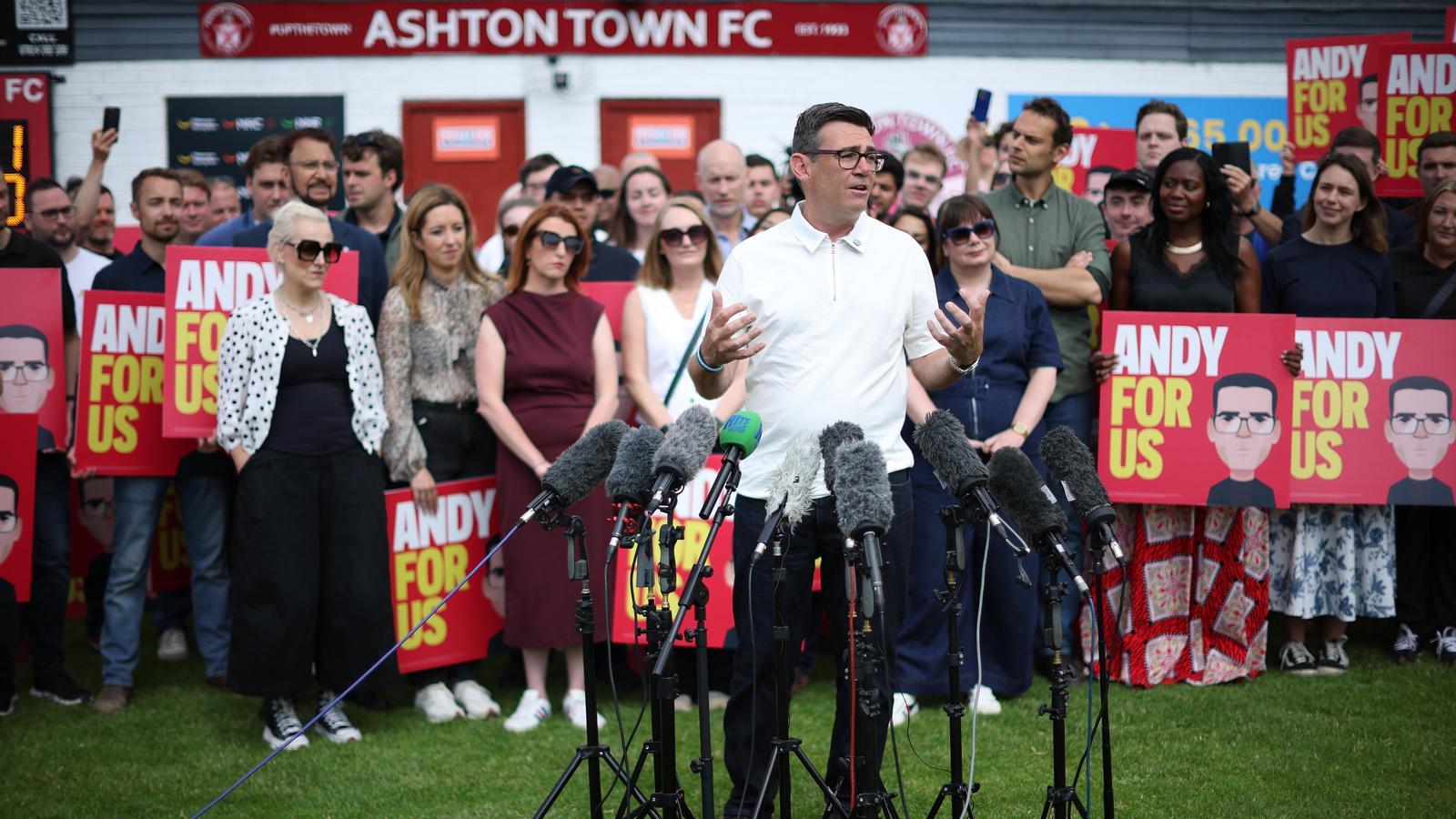 The new Labour MP elected for Makerfield, Andy Burnham, with his supporters this Friday morning, after winning the Makerfield by-election.