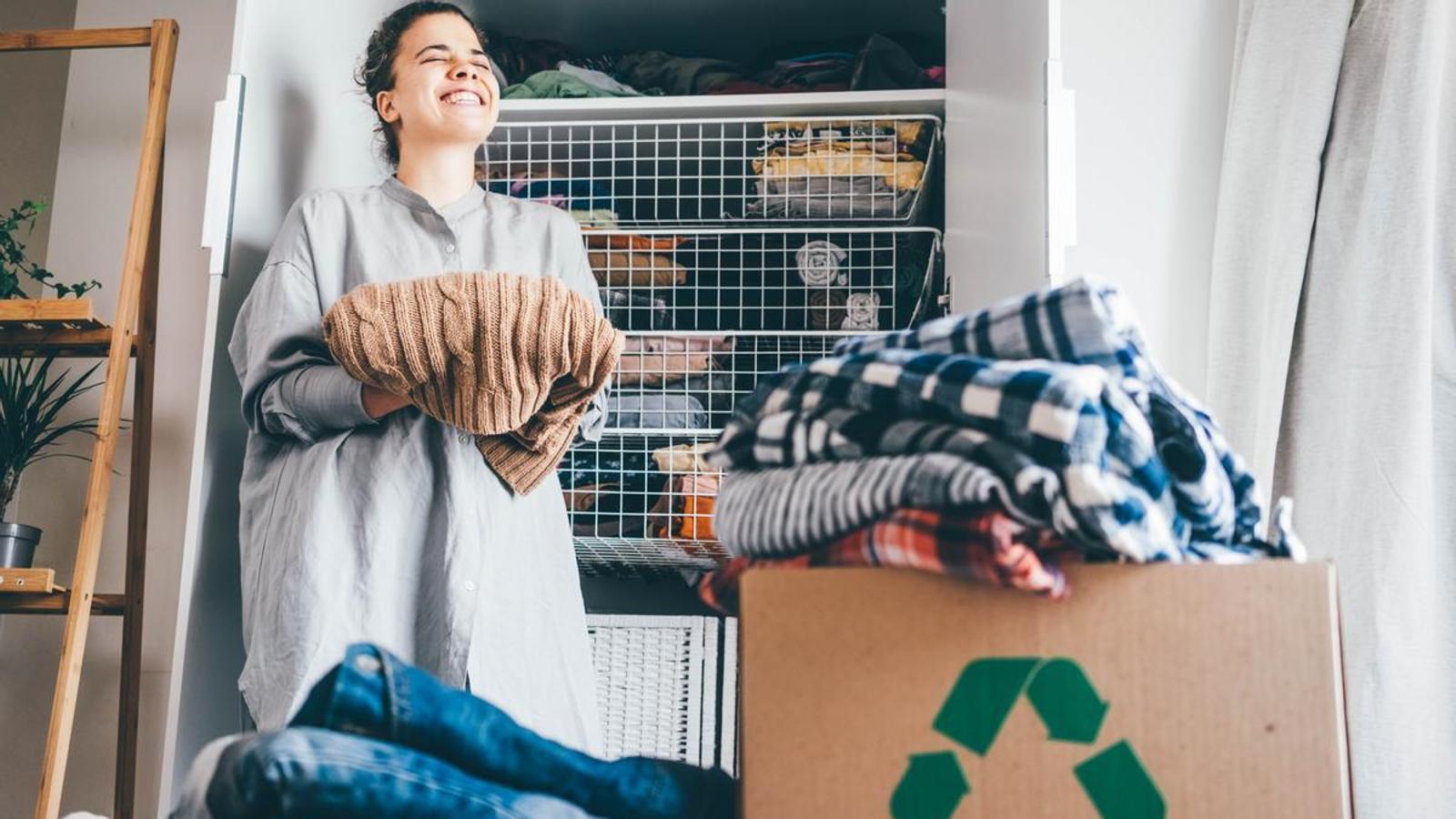 A woman cleaning out her closet in a resource image.