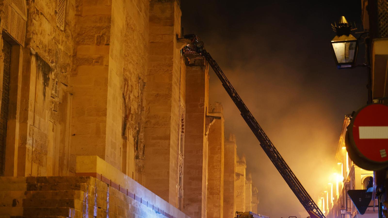 Firefighters working to extinguish the fire at the mosque in Córdoba.