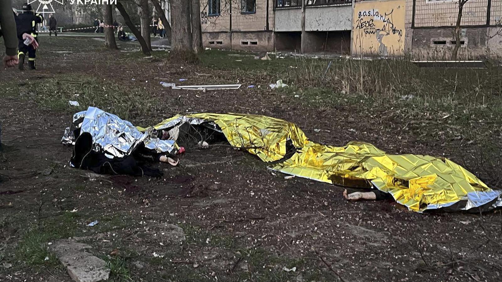 The bodies of some of the victims of Friday night's Russian attack on the town of Krivi Rig.