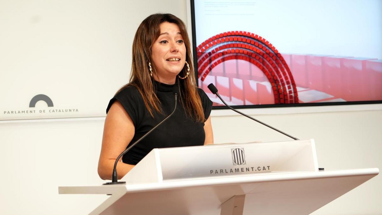 CUP MP Laure Vega in the Parliament's press room