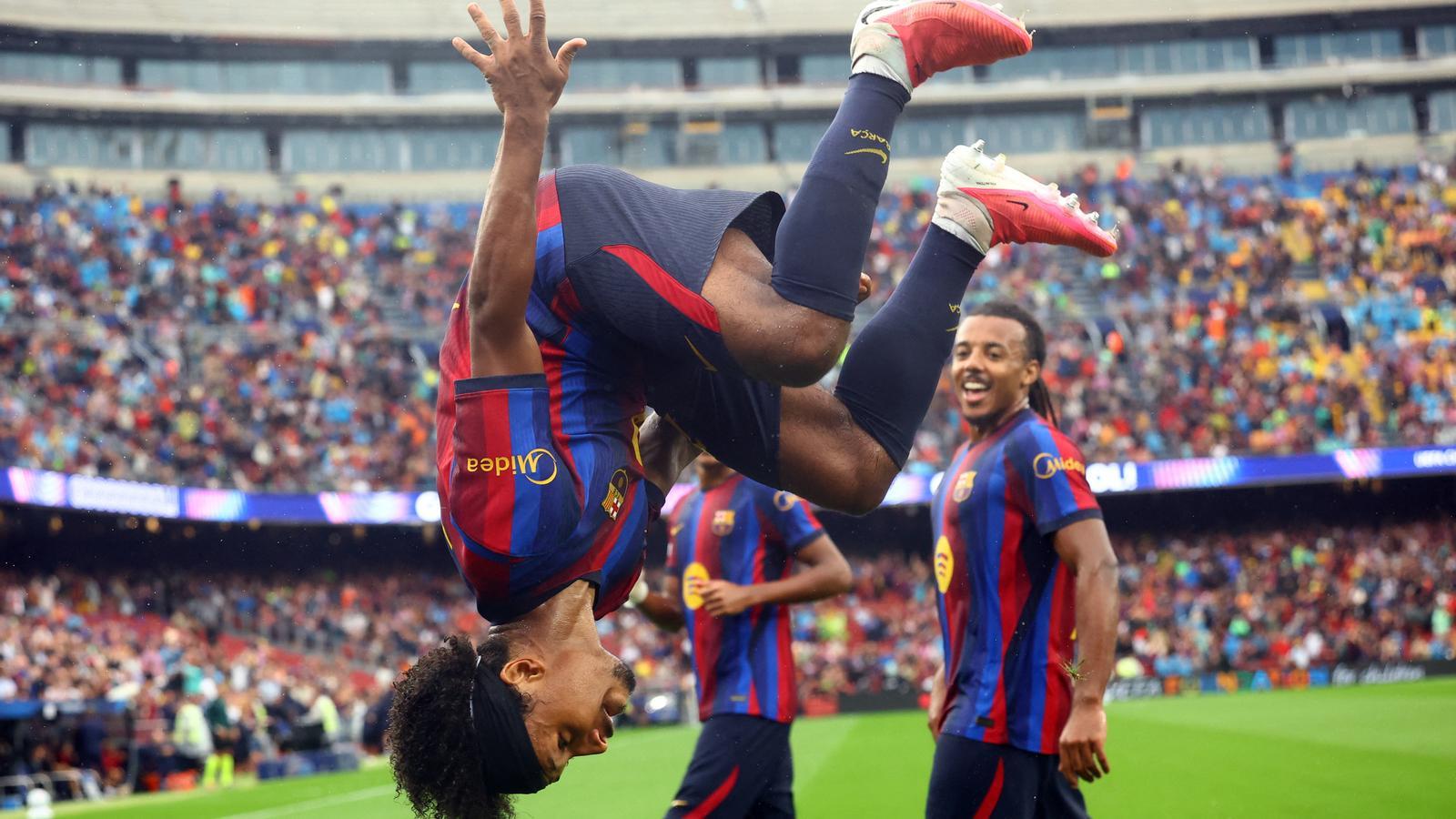 Adeyemi, from FC Barcelona, celebrates the team's second goal.