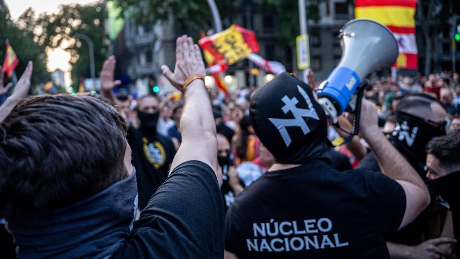Members of the National Nucleus perform the fascist salute at the Ferraz protests.