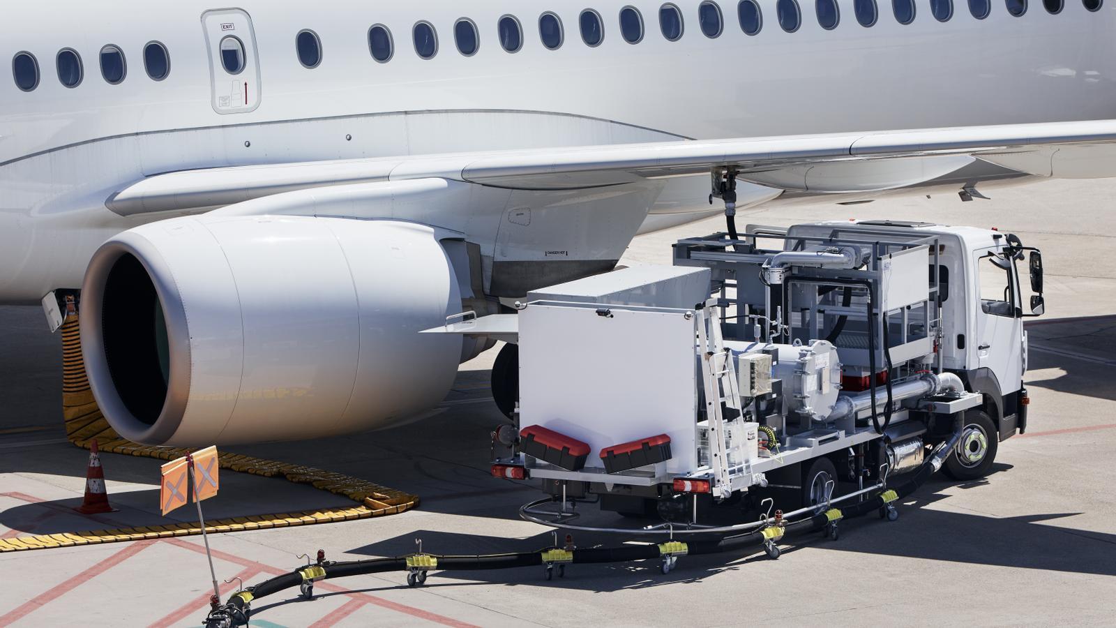 The refueling of an airliner on an airport runway during ground service tasks before the flight.