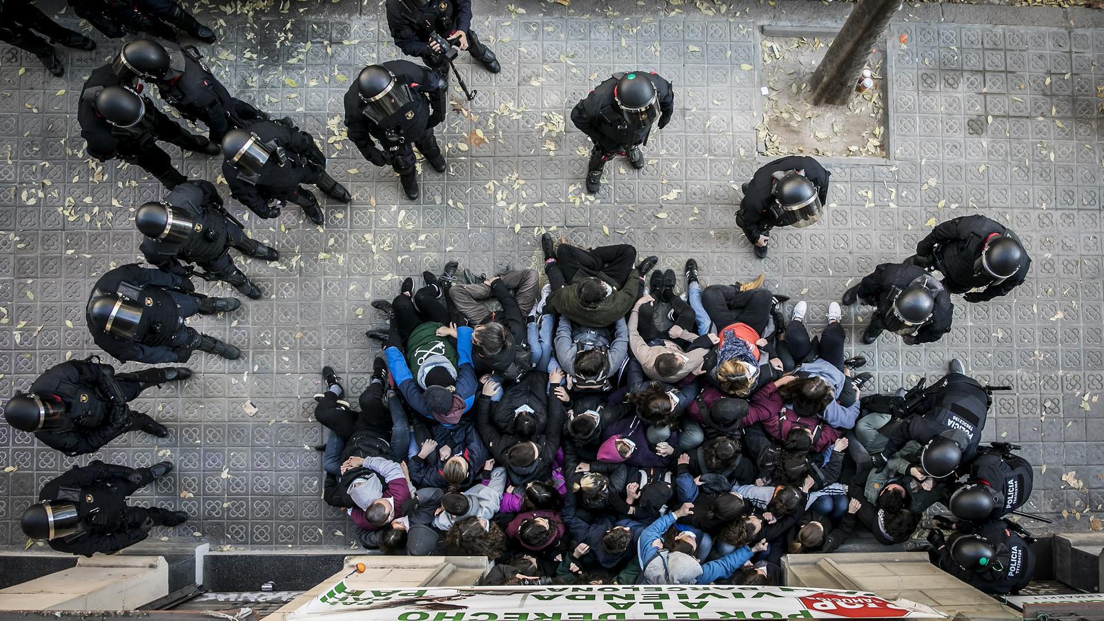 Housing activists stopping an eviction in Barcelona.