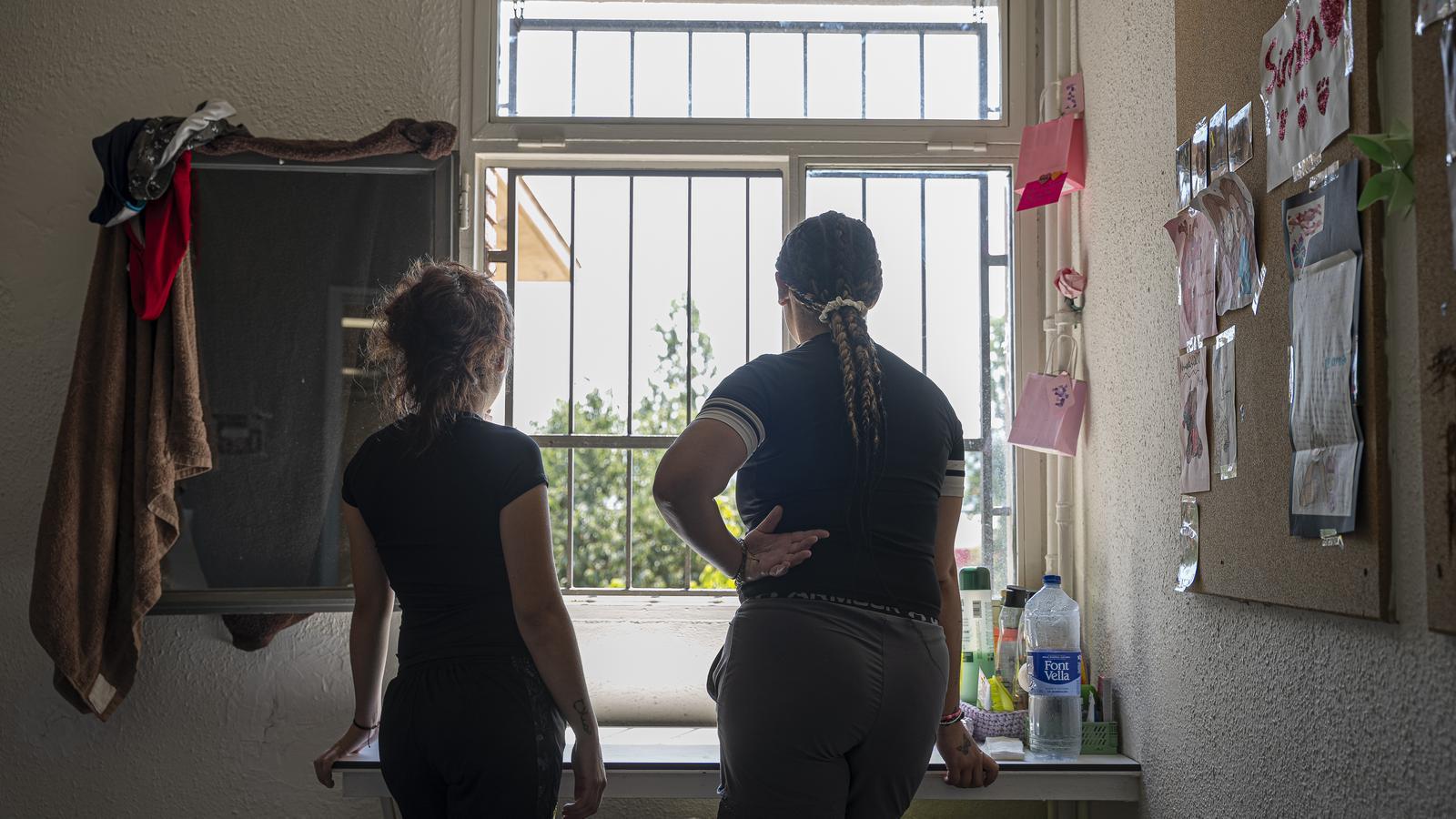 Two teenagers in a room at the Els Til·lers juvenile center, in Mollet del Vallès.
