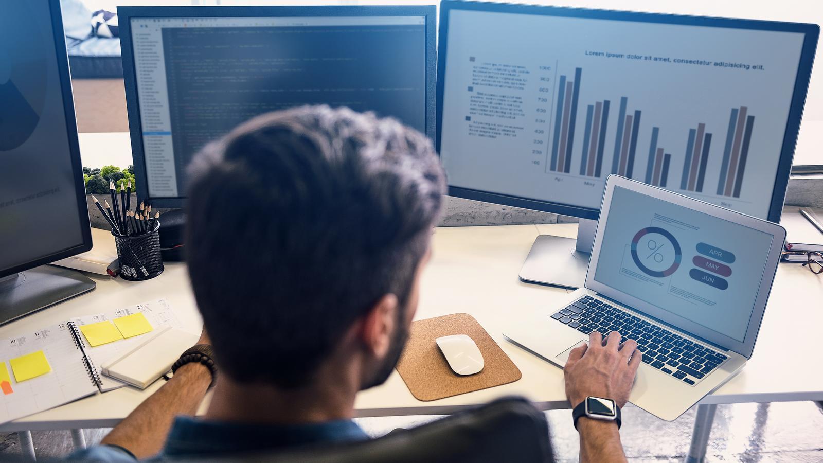 A young man works on data interpretation