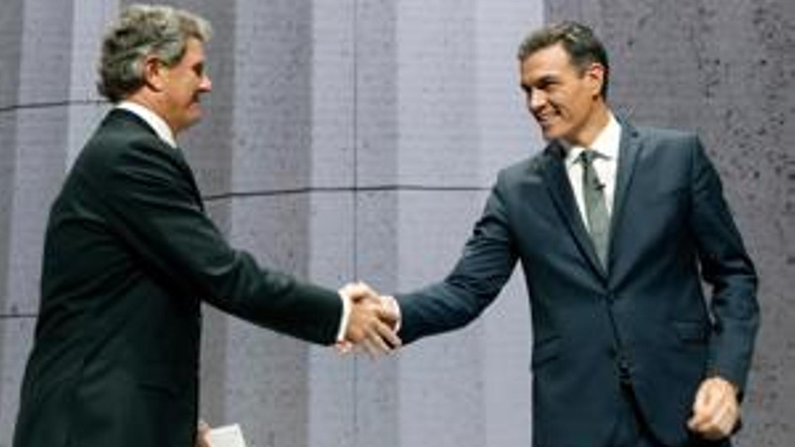 The President of the Government, Pedro Sanchez, greets Francisco J. Riberas (r), president of the Family Business Institute, during the closing, at the Valencia Congress Palace, of the XXI National Family Business Congress, held on October 30, 2018