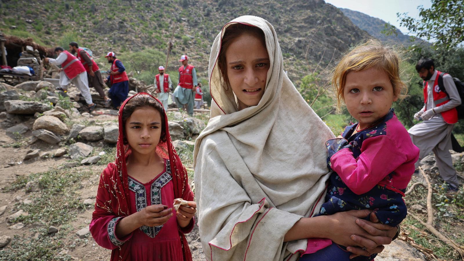 Three Afghan girls in the earthquake-hit Kunar province. The Taliban have banned women from taking photographs.