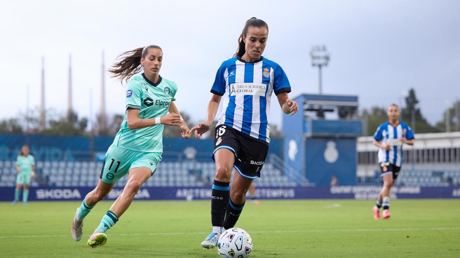 Espanyol and Alaves dispute a ball at the Dani Jarque Sports City