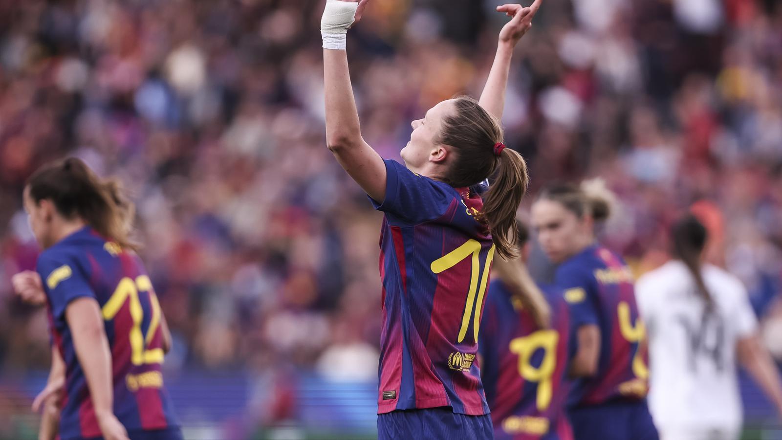 FC Barcelona forward Caroline Graham Hansen celebrates a goal during the second leg of the women's Champions League quarter-final against Real Madrid at Spotify Camp Nou.