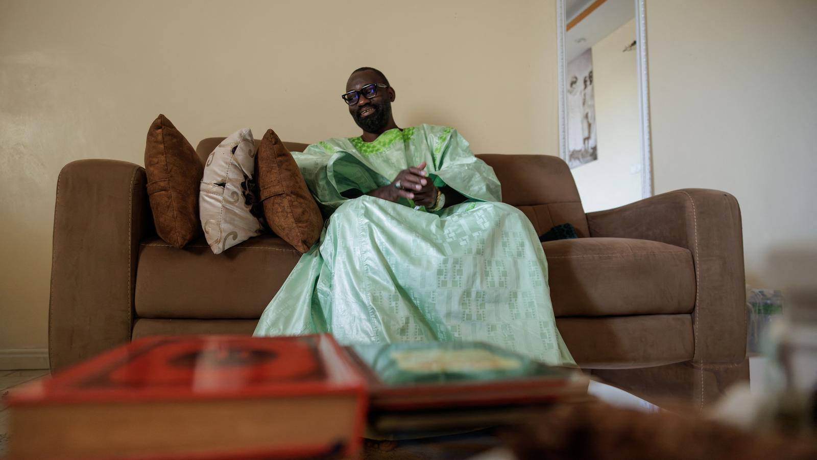 Ababacar Mboup, president of the collective Non a l'Homosexualite (Against Homosexuality) and former coordinator and honorary president of And Samm Jikko Yi, a Senegalese network that has promoted an anti-LGBTIQ law, speaks with journalists at his home in Dakar.