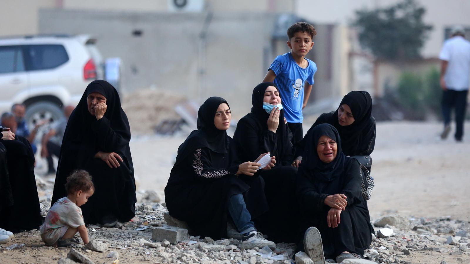 A group of Palestinian women mourn the deaths of their loved ones, killed Thursday in an Israeli army attack in Gaza City.