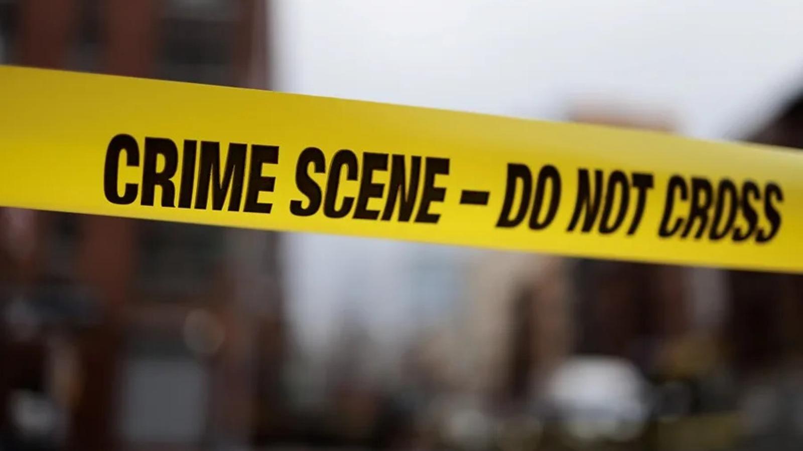 Archival photograph of a crime scene in the United States