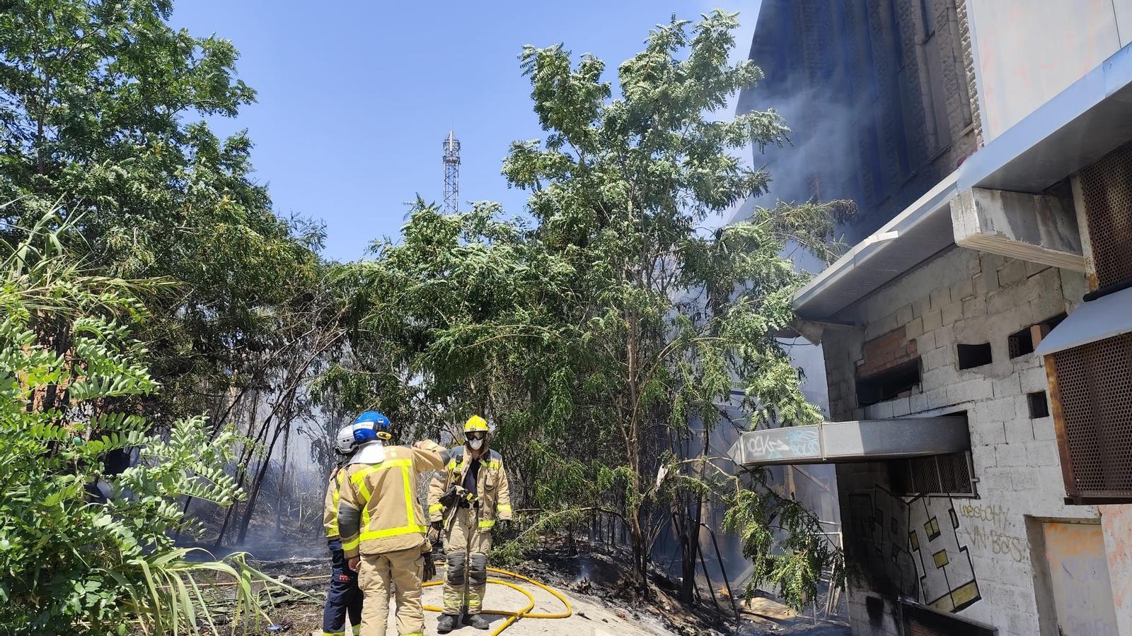 The Firefighters working in the area of the fire.